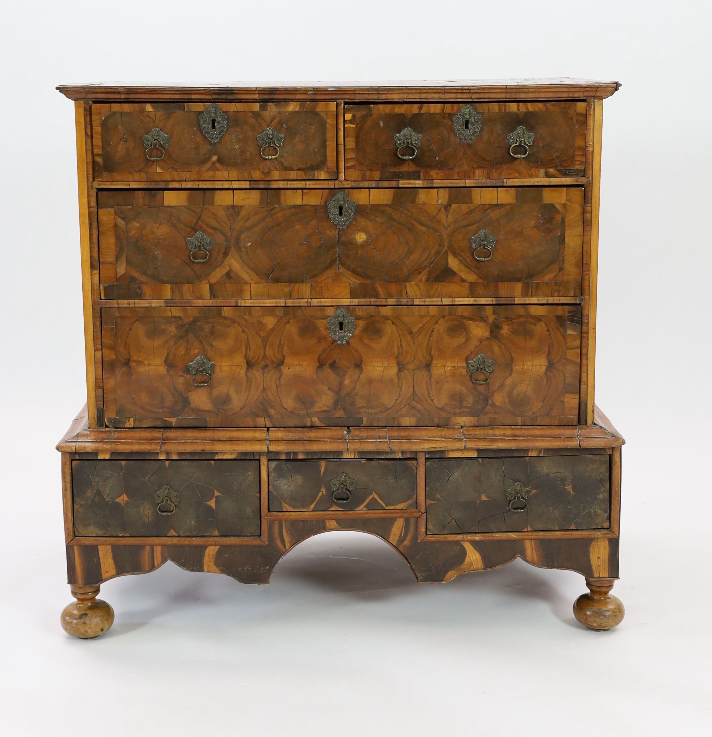 A William and Mary oyster olivewood and kingwood walnut chest on stand, W.97cm D.55cm H.95cm